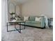 Cozy living room with comfortable seating, decorative rug, and stylish accents at 4549 Mcintosh Ln, Sarasota, FL 34232