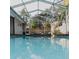Beautiful enclosed in-ground pool with privacy fence and plenty of room for entertaining at 4549 Mcintosh Ln, Sarasota, FL 34232