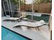Private pool deck with comfortable lounge chairs and privacy fence at 4549 Mcintosh Ln, Sarasota, FL 34232