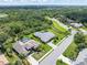 Sarasota home features a screened-in pool, lush landscaping, and paver patio, offering a private retreat in a desirable location at 4625 Deer Creek Blvd, Sarasota, FL 34238
