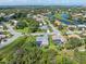 This home is on a lovely lot with mature trees, a pool, and close proximity to a tranquil neighborhood lake at 4625 Deer Creek Blvd, Sarasota, FL 34238