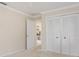 Bedroom with large closets, neutral walls, light-colored carpet and an entrance to the bathroom at 4625 Deer Creek Blvd, Sarasota, FL 34238