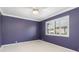 Bedroom with a window with plantation shutters and neutral carpet at 4625 Deer Creek Blvd, Sarasota, FL 34238