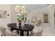 Elegant dining area offering a view of the living room and access to the outdoor lanai at 4625 Deer Creek Blvd, Sarasota, FL 34238