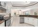 Bright kitchen with stainless appliances, custom cabinets and granite countertops at 4625 Deer Creek Blvd, Sarasota, FL 34238