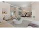 Inviting living room with stylish decor, plush seating, and seamless access to the dining area at 4625 Deer Creek Blvd, Sarasota, FL 34238