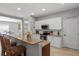Charming kitchen with island seating and an open floorplan at 4712 Charles Partin Dr, Parrish, FL 34219