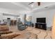 Open-concept living area, tile floors, and a clear view of the well-equipped kitchen at 4712 Charles Partin Dr, Parrish, FL 34219