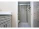 Modern bathroom features a tiled walk-in shower with glass doors at 4812 Kestral Park Cir # 20, Sarasota, FL 34231