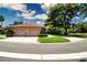 Charming single-story home featuring a two-car garage and brick circular driveway at 4812 Kestral Park Cir # 20, Sarasota, FL 34231