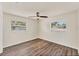 Bedroom boasts new flooring, natural light and a modern ceiling fan at 4907 4Th Avenue Nw Cir, Bradenton, FL 34209
