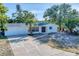 Charming single-story home features a well-manicured front yard and attached two-car garage, all freshly painted and inviting at 4907 4Th Avenue Nw Cir, Bradenton, FL 34209