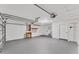 Spacious garage with ample storage, work sink, and automatic door opener at 4907 4Th Avenue Nw Cir, Bradenton, FL 34209