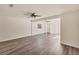 Spacious living area boasts sleek flooring and modern ceiling fan at 4907 4Th Avenue Nw Cir, Bradenton, FL 34209