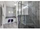 Luxurious bathroom showcasing a glass enclosed shower and separate soaking tub at 5237 Blossom Cv, Lakewood Ranch, FL 34211