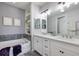 Stylish bathroom with double vanity, soaking tub, and elegant fixtures at 5237 Blossom Cv, Lakewood Ranch, FL 34211