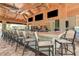 Resident bar and gathering spot with TVs, bar seating and an expansive selection of beverages at 5301 Bartolomeo St, Sarasota, FL 34238