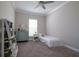 Neutral bedroom featuring a single bed and blue dresser with tasteful decor at 5301 Bartolomeo St, Sarasota, FL 34238