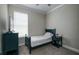 Bedroom boasting a single bed, blue dresser, and a lovely decorative theme at 5301 Bartolomeo St, Sarasota, FL 34238