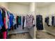 Walk-in closet with ample shelving and storage for clothes and accessories at 5301 Bartolomeo St, Sarasota, FL 34238