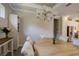 Bright dining area features an elegant chandelier and adjacent access to the kitchen at 5301 Bartolomeo St, Sarasota, FL 34238