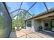 Screened-in patio offers a relaxing outdoor space with views of the backyard at 5301 Bartolomeo St, Sarasota, FL 34238