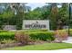 Entrance sign to Esplanade on Palmer Ranch, surrounded by manicured landscaping at 5301 Bartolomeo St, Sarasota, FL 34238