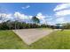 Outdoor community basketball court with playground area for outdoor recreation activities at 5717 71St E St, Palmetto, FL 34221