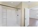 Bright bathroom featuring a walk-in shower with black hardware and a clear door at 5717 71St E St, Palmetto, FL 34221