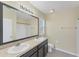 Bathroom with double sinks, and a large mirror at 5717 71St E St, Palmetto, FL 34221