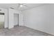 Simple bedroom featuring tile floors, a ceiling fan, and a closet at 5717 71St E St, Palmetto, FL 34221