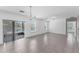 Spacious living room with sliding glass doors leading to the pool area at 5717 71St E St, Palmetto, FL 34221