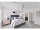 Elegant main bedroom with neutral tones and en-suite bathroom at 5717 71St E St, Palmetto, FL 34221