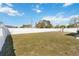View of the large, well-maintained backyard, enclosed with a privacy fence at 5909 33Rd E Dr, Palmetto, FL 34221