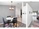 Eat-in kitchen area with a chandelier and a round table for gatherings at 5909 33Rd E Dr, Palmetto, FL 34221