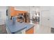 Modern kitchen with stainless steel appliances and a breakfast bar at 5909 33Rd E Dr, Palmetto, FL 34221