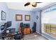 Bright office space with a window view, a ceiling fan, and wood-look floors at 5909 33Rd E Dr, Palmetto, FL 34221
