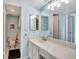En suite bathroom with double sinks at 6157 Midnight Pass Rd # E65, Sarasota, FL 34242