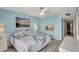 Bedroom featuring a king bed and private bathroom at 6157 Midnight Pass Rd # E65, Sarasota, FL 34242
