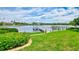 Lush green community space that offers direct access to waterfront piers at 6157 Midnight Pass Rd # E65, Sarasota, FL 34242