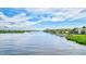 Expansive water view showcasing the serene surroundings of the condo community at 6157 Midnight Pass Rd # E65, Sarasota, FL 34242