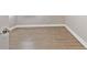 Spacious room features modern neutral paint with a new tiled floor and white baseboards at 620 Nasturtium Ct, Nokomis, FL 34275