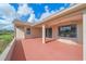 Beautiful backyard patio with stunning pond and golf course view at 6408 Rookery Cir, Bradenton, FL 34203
