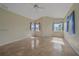Bright bedroom featuring tile floors, recessed lighting and windows with decorative sheer curtains at 6408 Rookery Cir, Bradenton, FL 34203