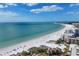 Spectacular beach view from a high-rise building showing white sand and inviting turquoise waters at 6415 Midnight Pass Rd # 710, Sarasota, FL 34242