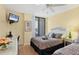 Comfortable second bedroom with desk and balcony access at 6415 Midnight Pass Rd # 710, Sarasota, FL 34242