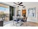 Dining area adjacent to balcony and kitchen featuring a contemporary table and chairs at 6415 Midnight Pass Rd # 710, Sarasota, FL 34242