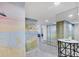 Hallway with ocean mural and mirrored closet doors at 6415 Midnight Pass Rd # 710, Sarasota, FL 34242