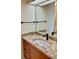 Bathroom vanity with granite countertops and modern faucet at 6430 Sun Eagle Ln # 203, Bradenton, FL 34210