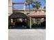 Inviting exterior with covered parking, and manicured landscaping at 6430 Sun Eagle Ln # 203, Bradenton, FL 34210